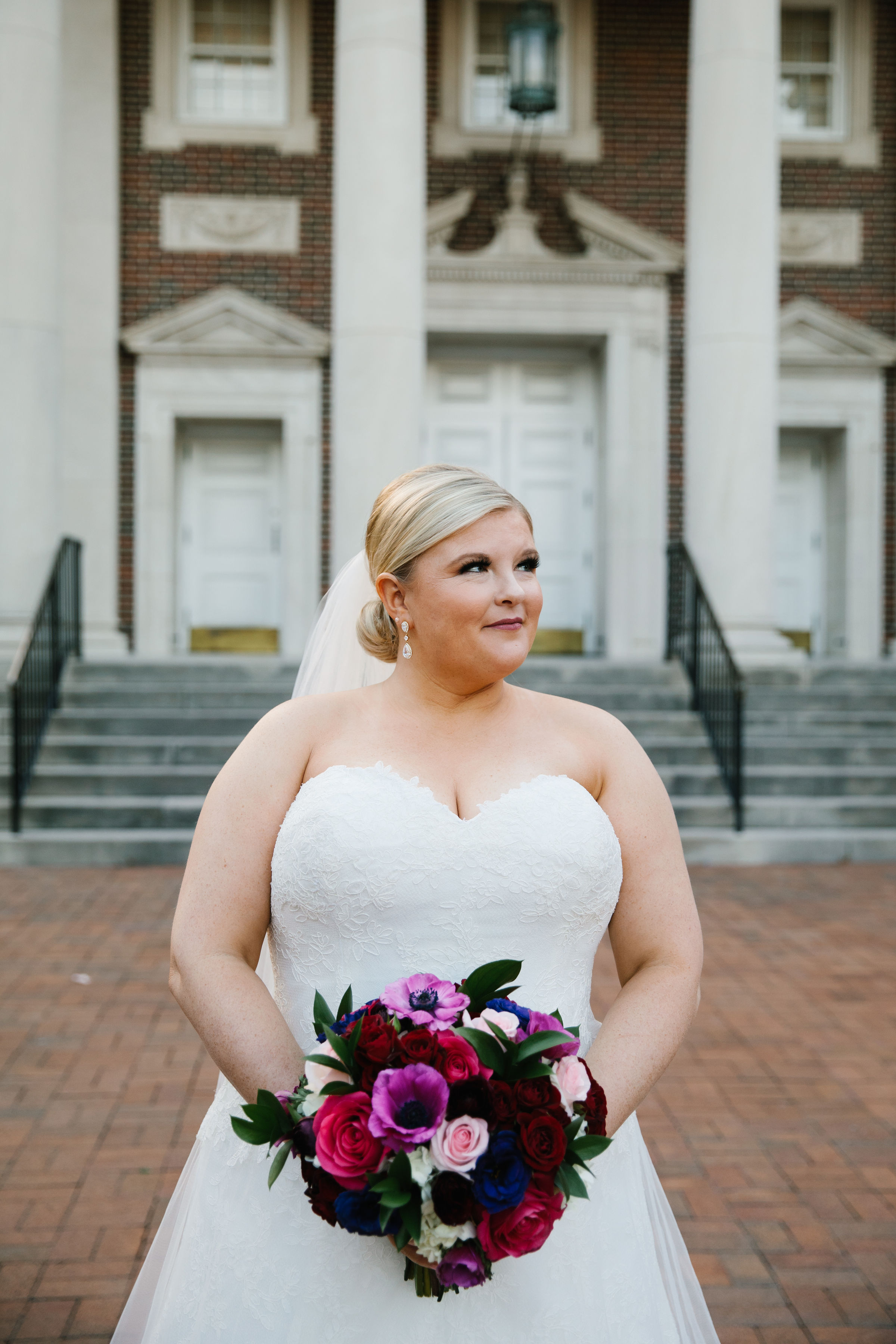 Bride with Flower bouquet outside of Perkins chapel